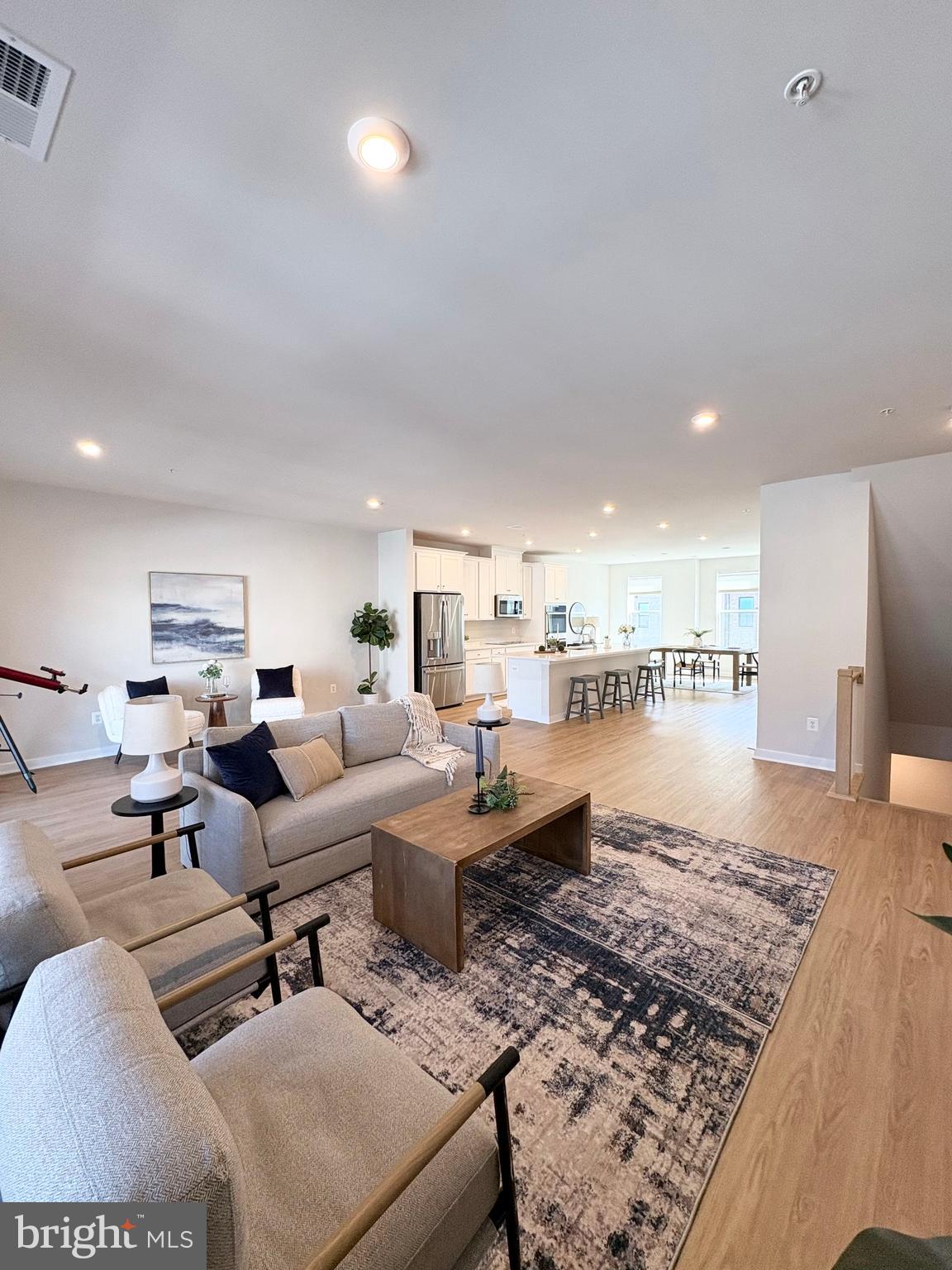 14114 Gypsum Loop, Unit 64 Chantilly, VA 20151 - Photo 15 of 40 a living room with furniture and a rug