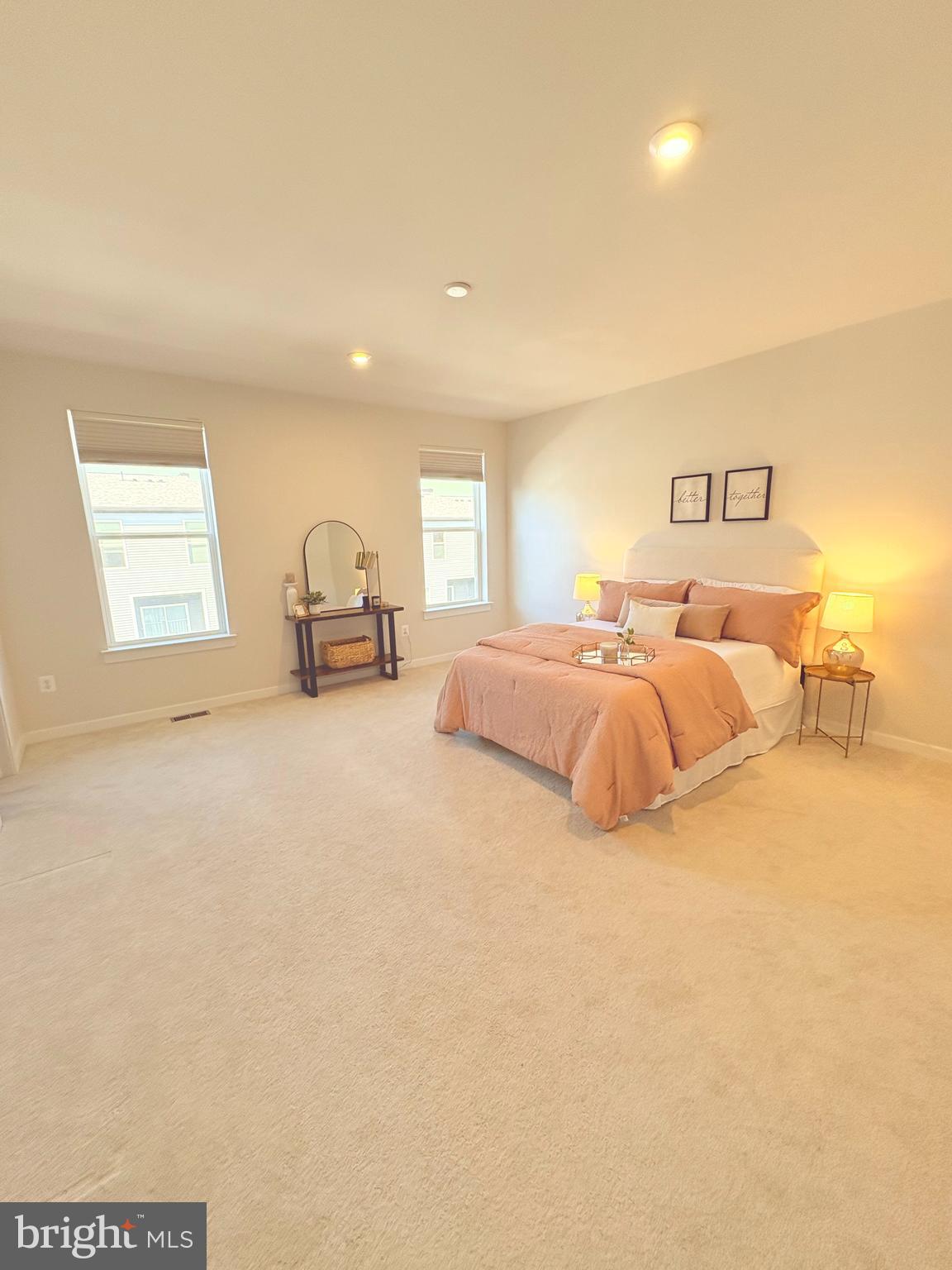 14114 Gypsum Loop, Unit 64 Chantilly, VA 20151 - Photo 16 of 40 a bedroom with a bed and a couch