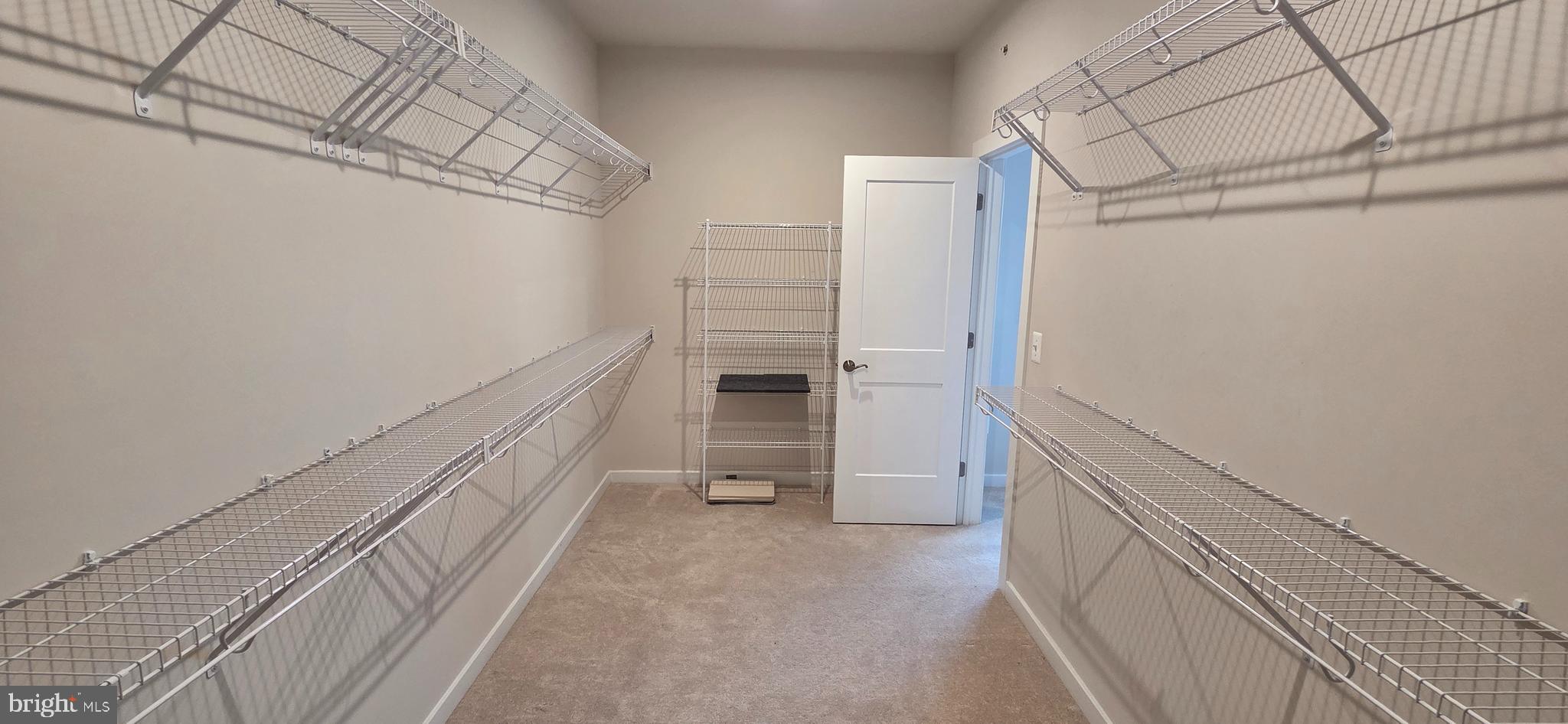 14114 Gypsum Loop, Unit 64 Chantilly, VA 20151 - Photo 20 of 40 a view of walk in closet