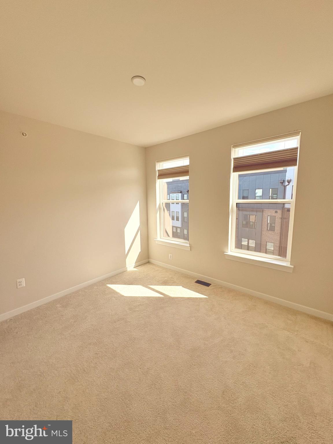 14114 Gypsum Loop, Unit 64 Chantilly, VA 20151 - Photo 25 of 40 an empty room with a window