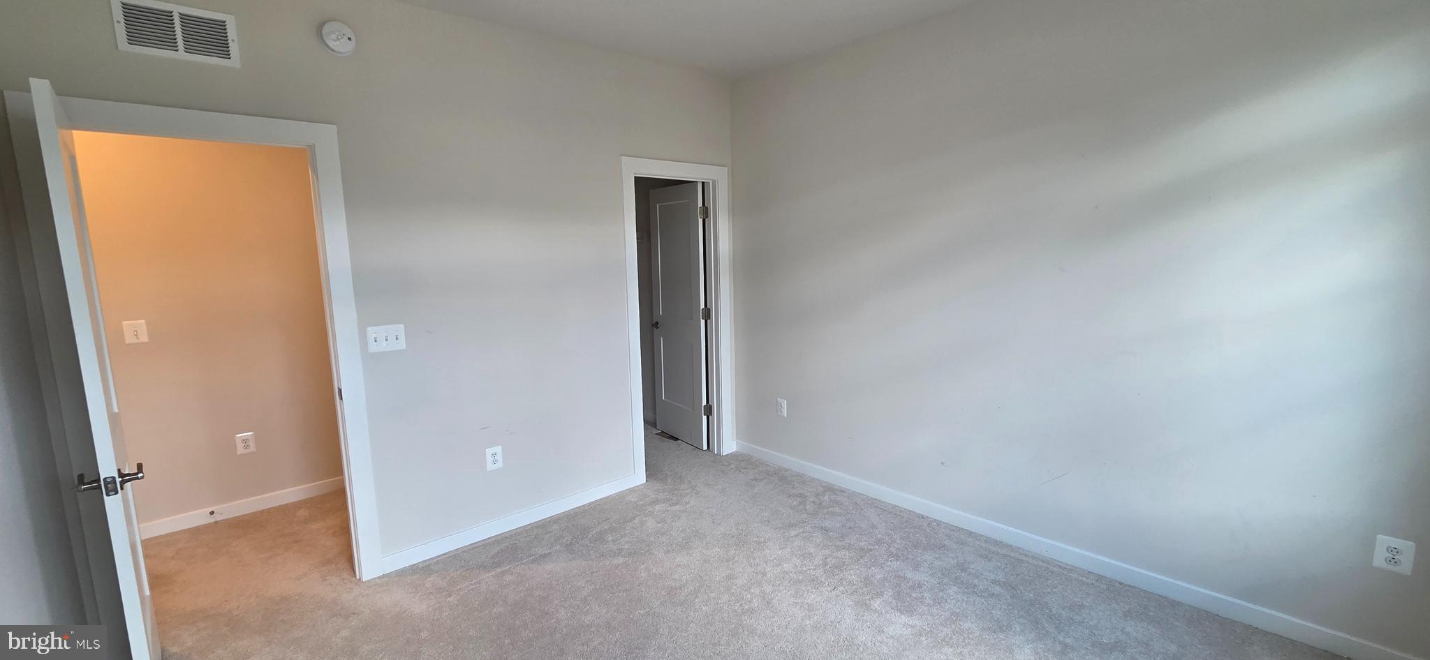 14114 Gypsum Loop, Unit 64 Chantilly, VA 20151 - Photo 33 of 40 an empty room with windows