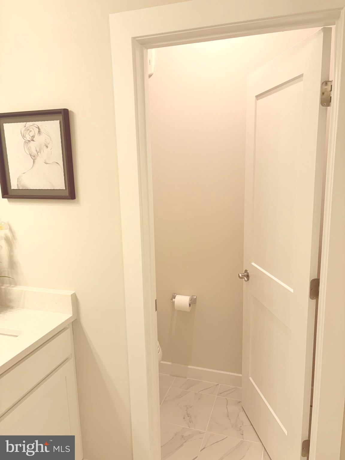 14114 Gypsum Loop, Unit 64 Chantilly, VA 20151 - Photo 36 of 40 a bathroom with a shower