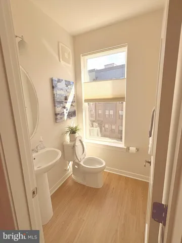 a bathroom with a sink a bathtub and a toilet
