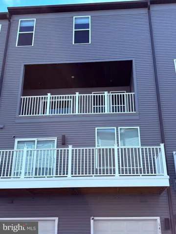 a view of a brick house with a window