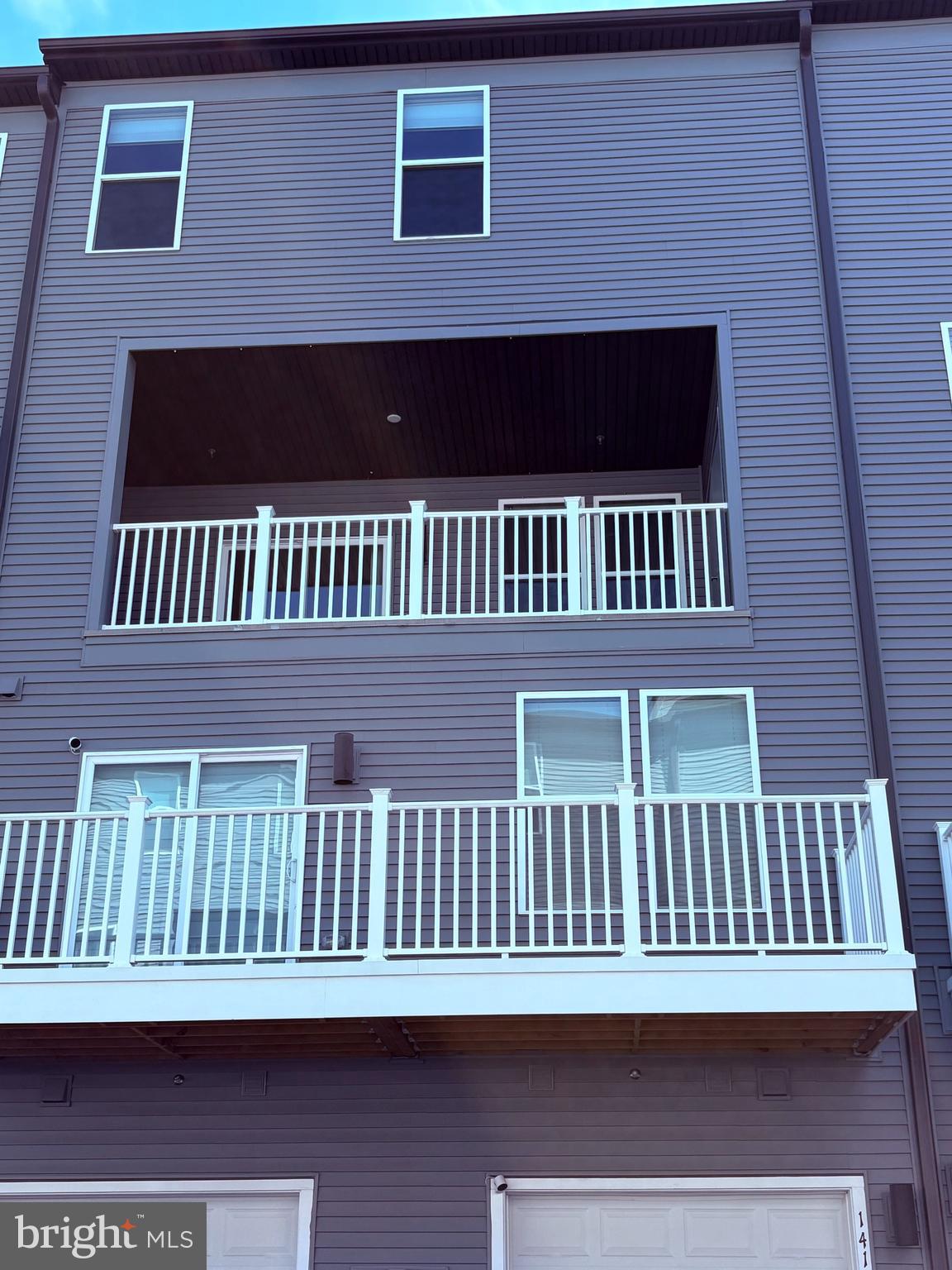14114 Gypsum Loop, Unit 64 Chantilly, VA 20151 - Photo 38 of 40 a view of a brick house with a window
