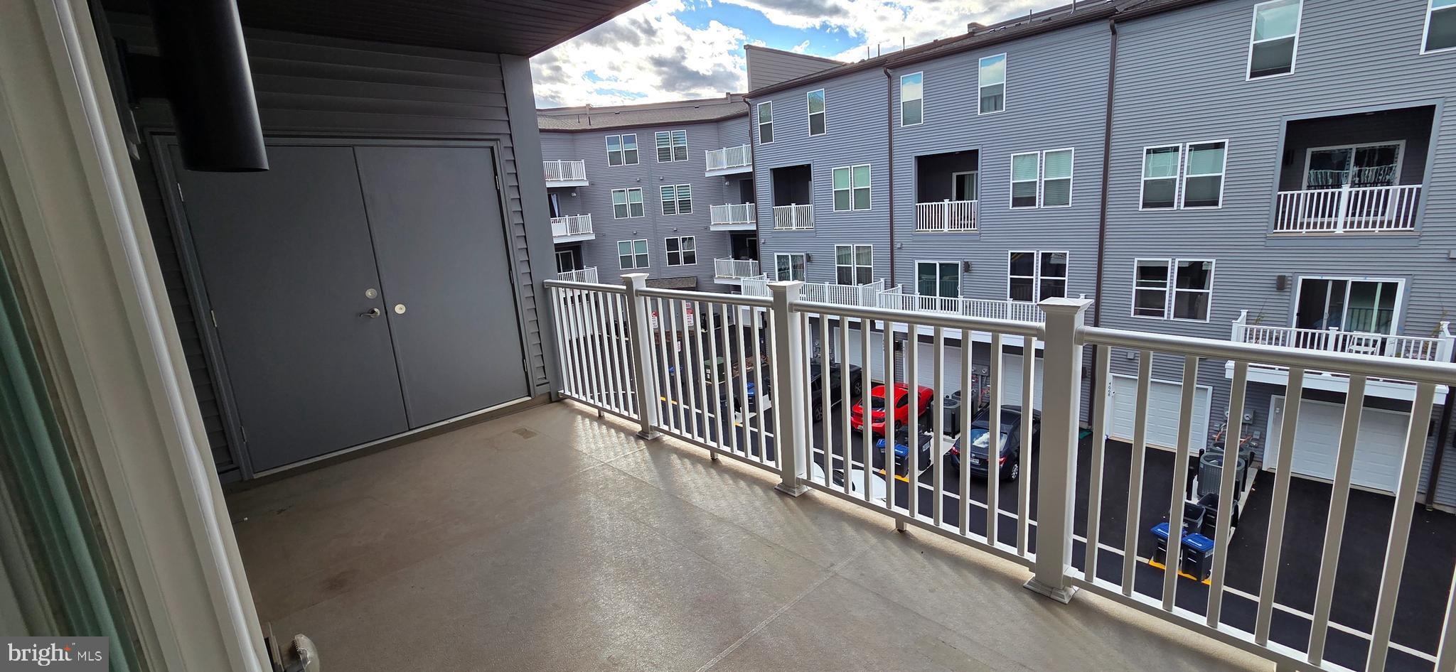 14114 Gypsum Loop, Unit 64 Chantilly, VA 20151 - Photo 40 of 40 a view of a building from a balcony