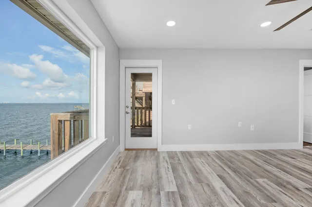 a bathroom with a sink a mirror and a bathtub