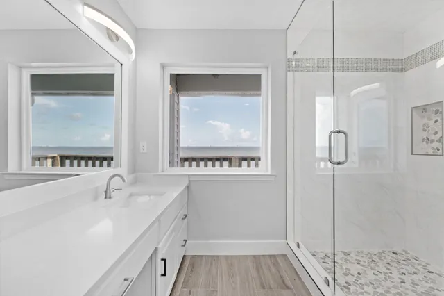 a view of a balcony with wooden floor