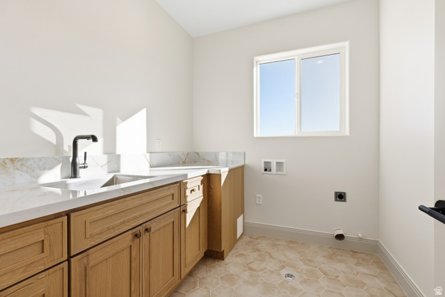 226 East 1100 North Hurricane, UT 84737 - Photo 40 of 49 Laundry room featuring washer hookup, electric dryer hookup, and cabinet space