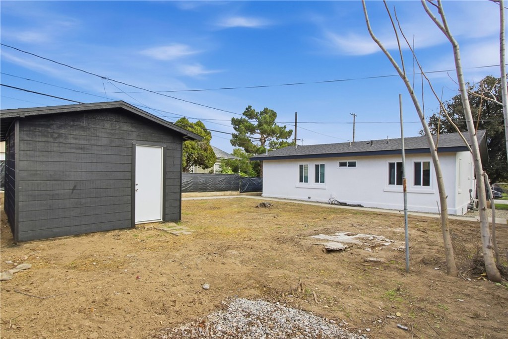 845 North 9th Street Colton, CA 92324 - Photo 11 of 11 a view of a house with a yard
