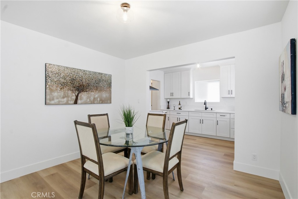 845 North 9th Street Colton, CA 92324 - Photo 4 of 11 a view of a dining room with furniture and wooden floor