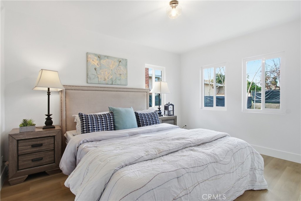 845 North 9th Street Colton, CA 92324 - Photo 10 of 11 a bedroom with a bed and a night stand