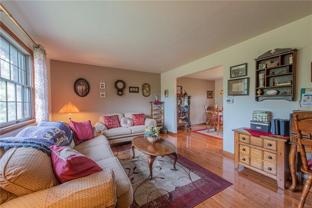 1453 Airport Road Vandergrift, PA 15690 - Photo 16 of 48 a living room with furniture and a wooden floor