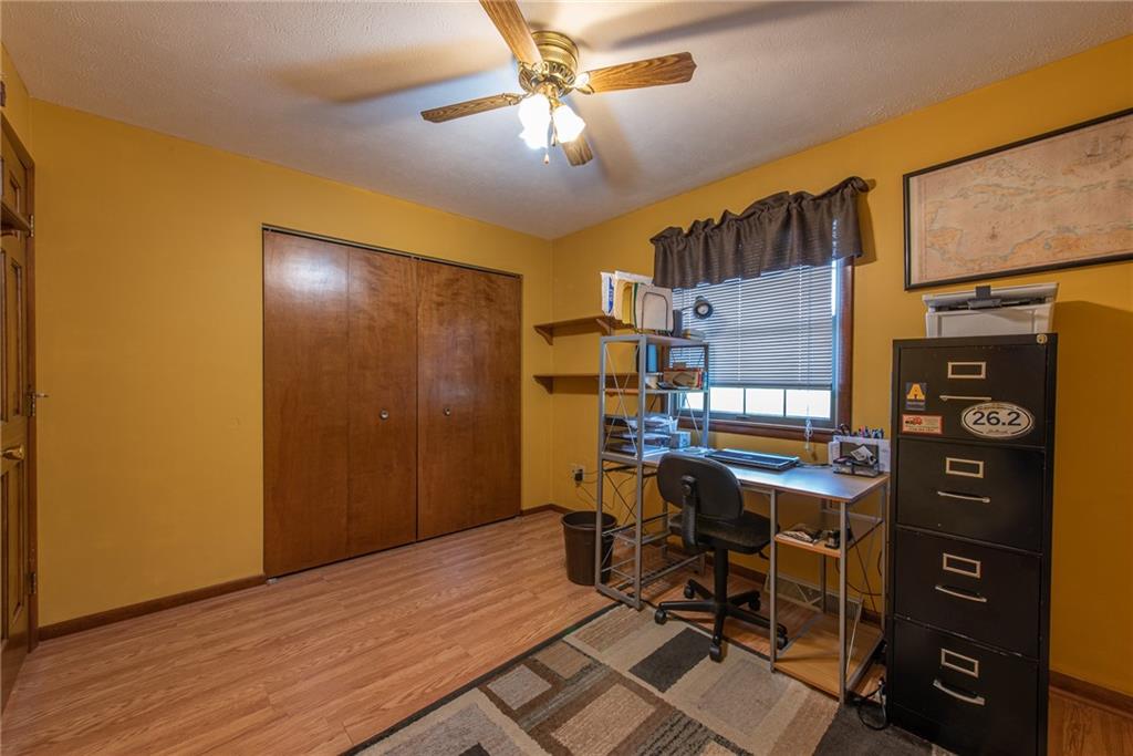 1453 Airport Road Vandergrift, PA 15690 - Photo 27 of 48 a view of a workspace with furniture and wooden floor