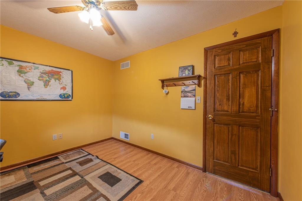 1453 Airport Road Vandergrift, PA 15690 - Photo 28 of 48 a view of a hallway with wooden floor