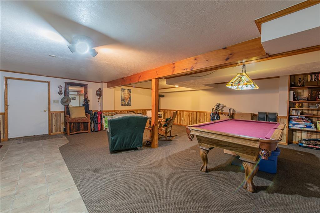 1453 Airport Road Vandergrift, PA 15690 - Photo 33 of 48 a room with furniture and air hockey table