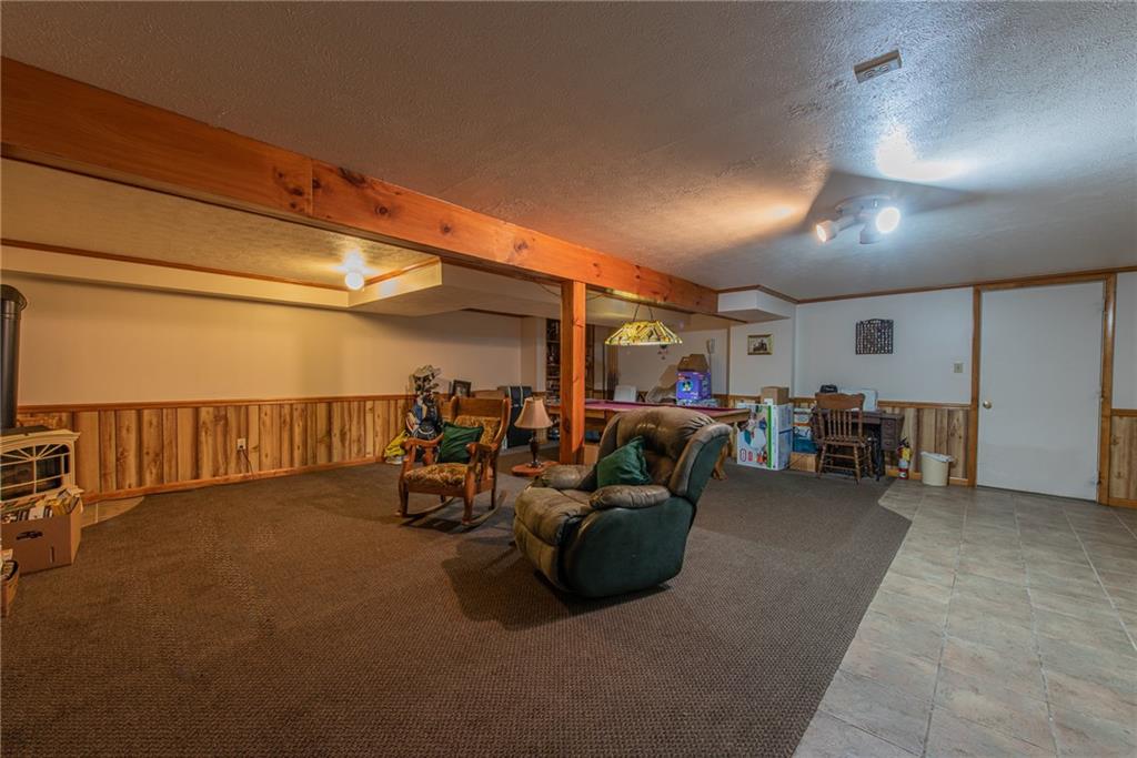 1453 Airport Road Vandergrift, PA 15690 - Photo 34 of 48 a view of a livingroom with furniture and a garage