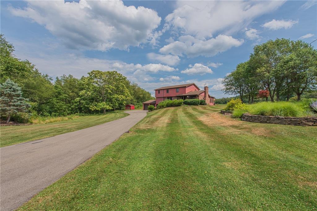 1453 Airport Road Vandergrift, PA 15690 - Photo 38 of 48 a view of an swimming pool with a yard and a big yard