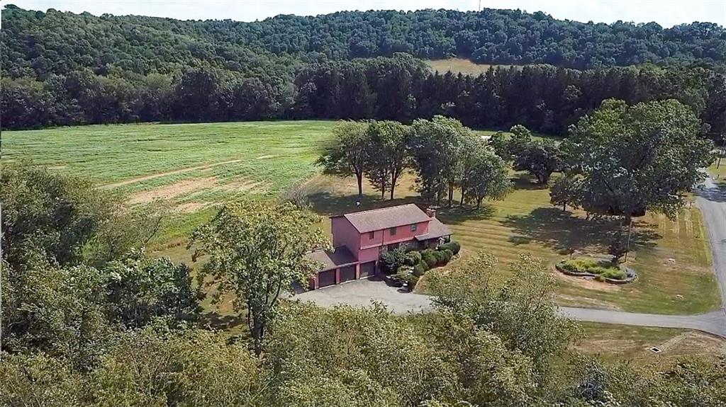 1453 Airport Road Vandergrift, PA 15690 - Photo 47 of 48 an aerial view of a house with a yard