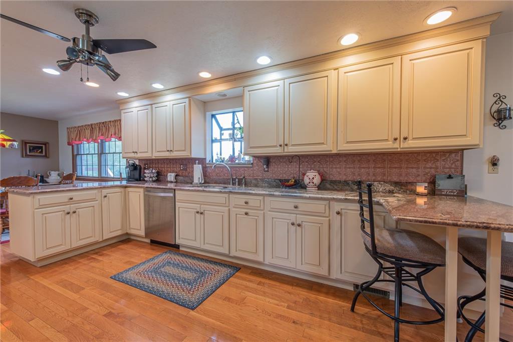 1453 Airport Road Vandergrift, PA 15690 - Photo 6 of 48 a kitchen with granite countertop appliances cabinets and furniture