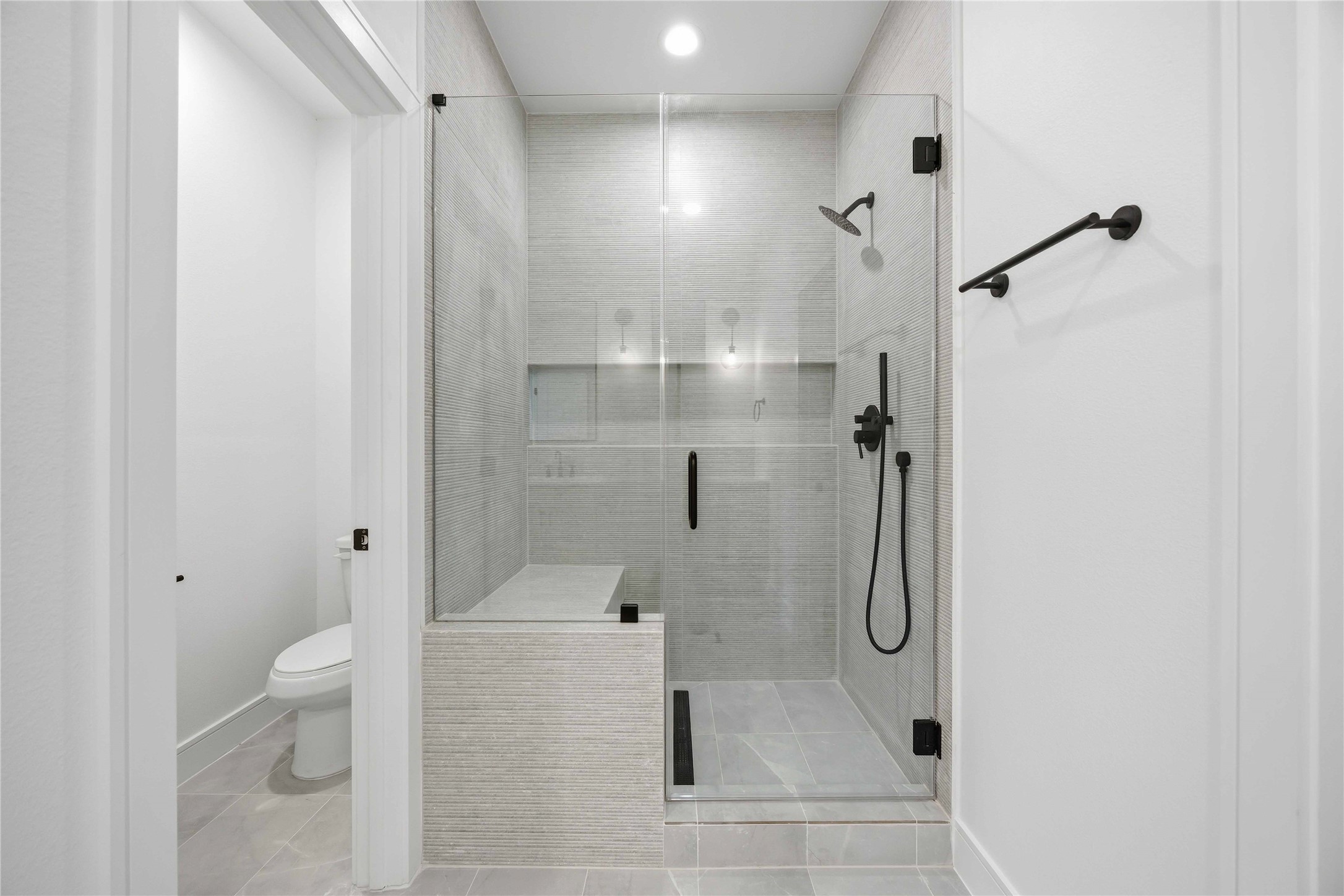 8019 Grandview Street, Unit B Houston, TX 77051 - Photo 23 of 30 a bathroom with a shower and toilet
