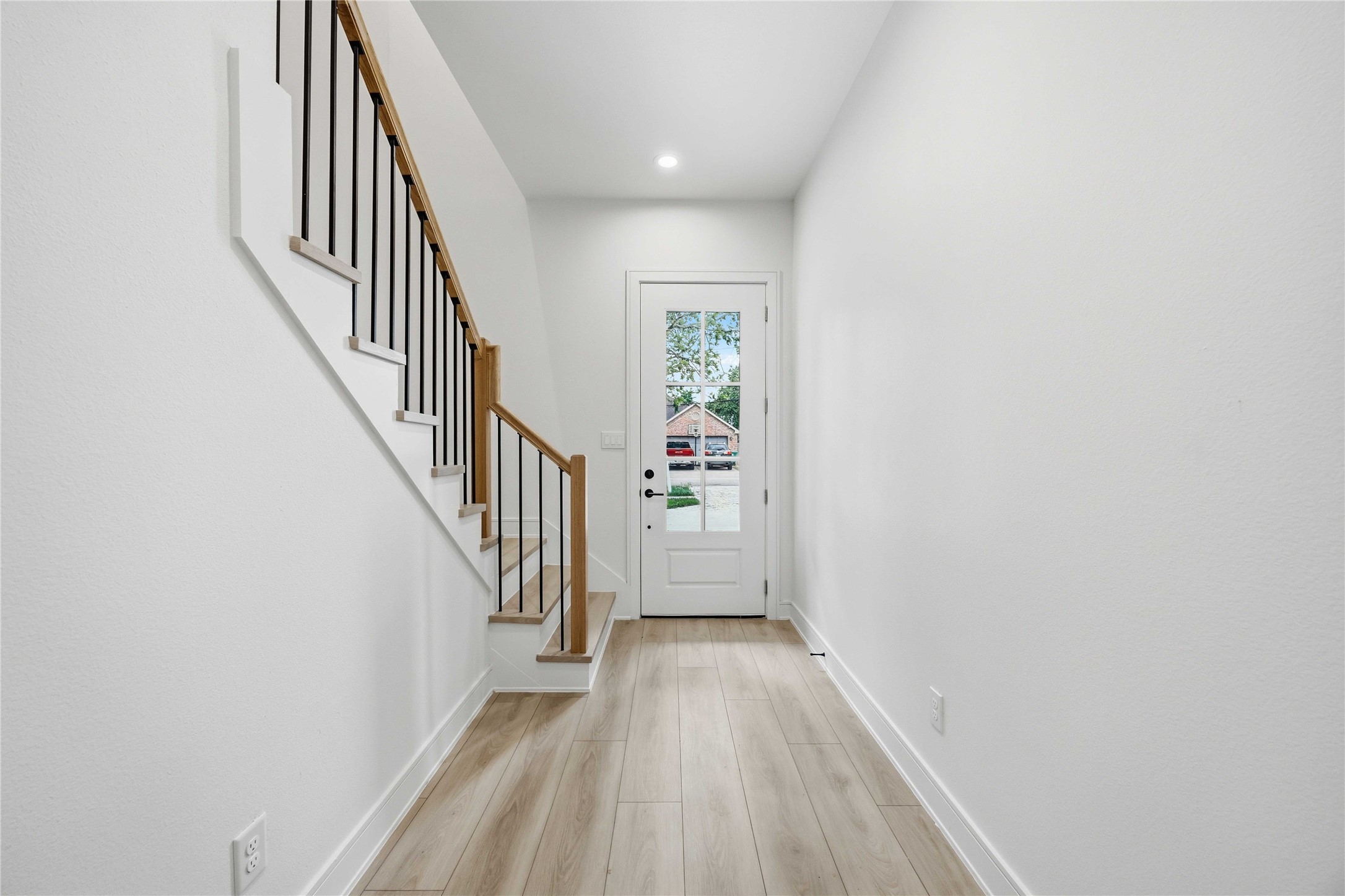 8019 Grandview Street, Unit B Houston, TX 77051 - Photo 4 of 30 a view of a hallway with wooden floor and entryway