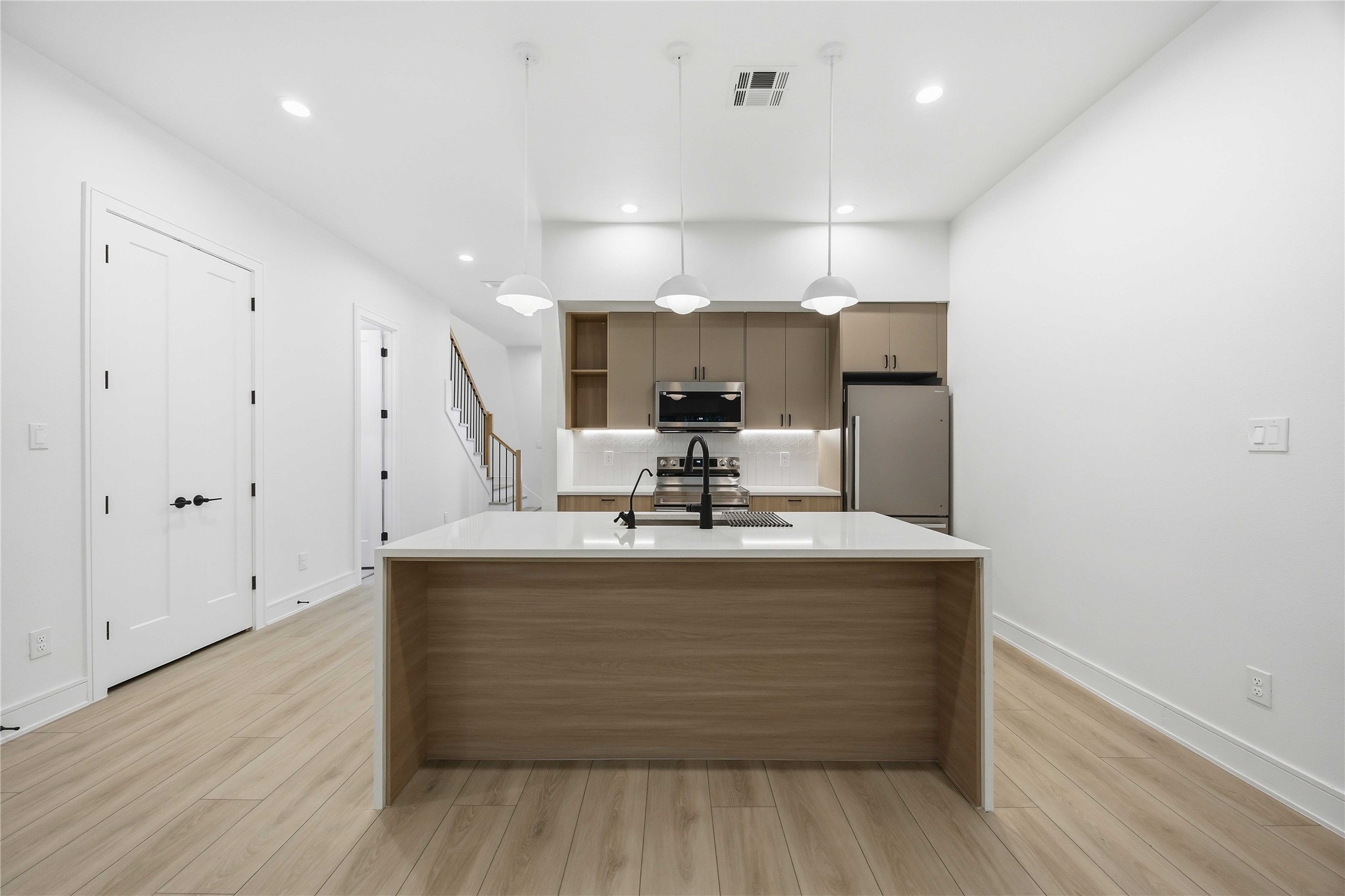 8019 Grandview Street, Unit B Houston, TX 77051 - Photo 8 of 30 a view of kitchen with granite countertop living room