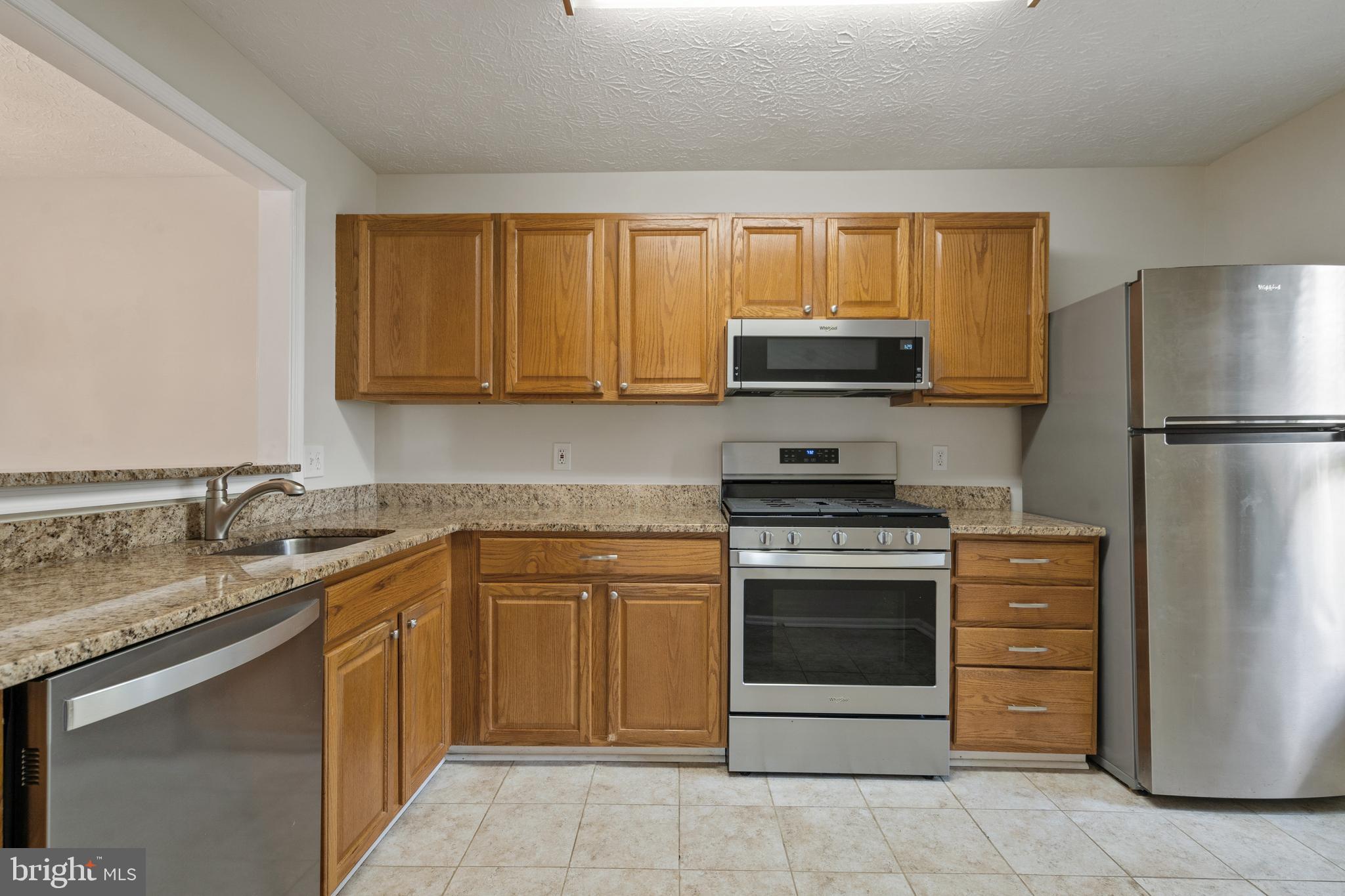 2303 Hunter's Run Drive, Unit 2303 Reston, VA 20191 - Photo 11 of 38 Kitchen