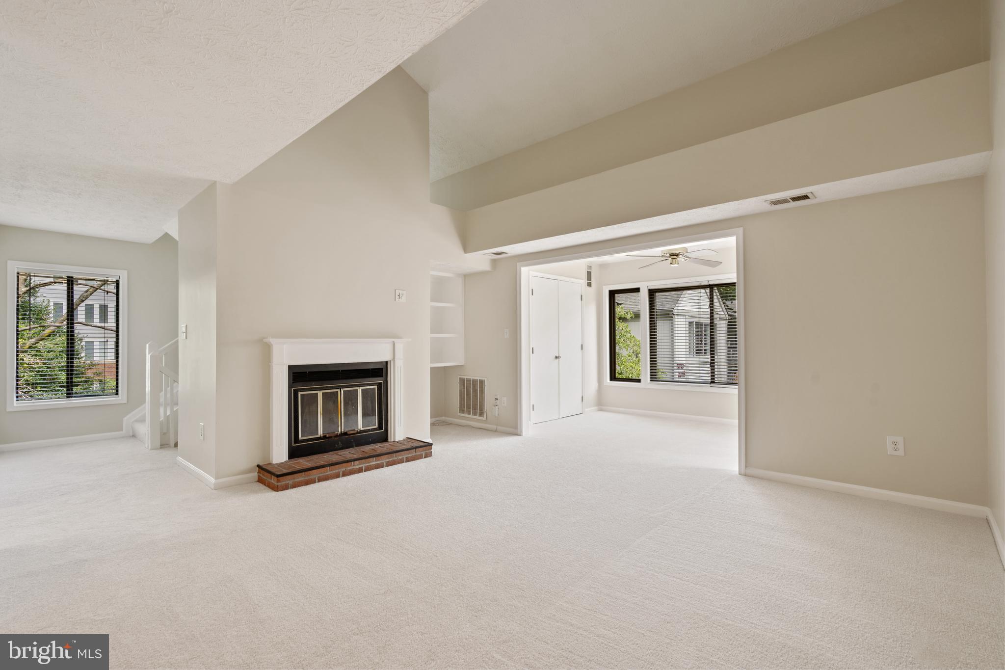 2303 Hunter's Run Drive, Unit 2303 Reston, VA 20191 - Photo 15 of 38 Family Room/Den with Fireplace
