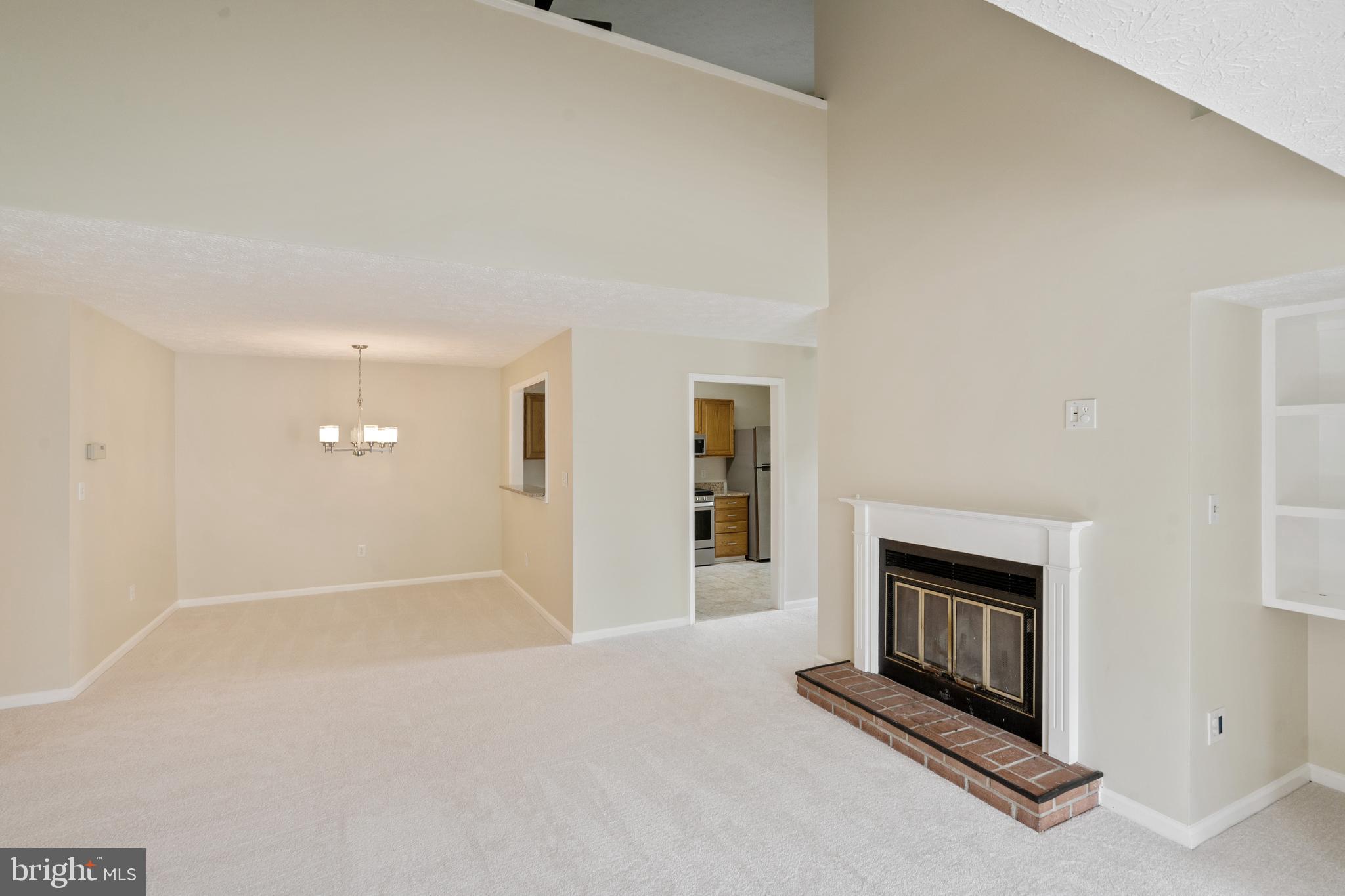 2303 Hunter's Run Drive, Unit 2303 Reston, VA 20191 - Photo 18 of 38 Family Room/Dining Room