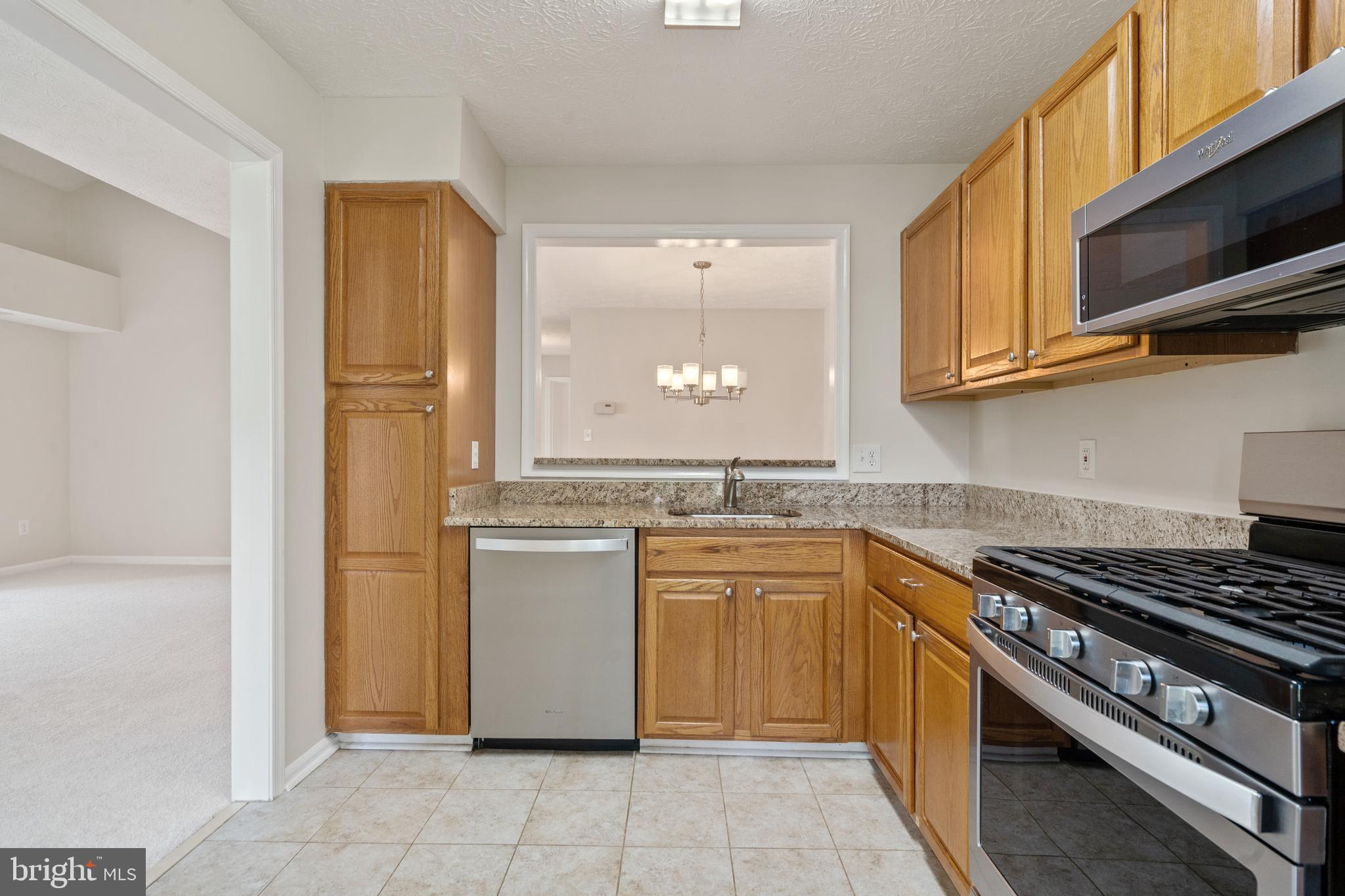 2303 Hunter's Run Drive, Unit 2303 Reston, VA 20191 - Photo 9 of 38 Kitchen