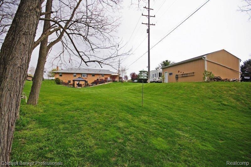 110 East Coon Lake Road Howell, MI 48843 - Photo 18 of 20 110 E Coon Lk - Rear 2.JPG