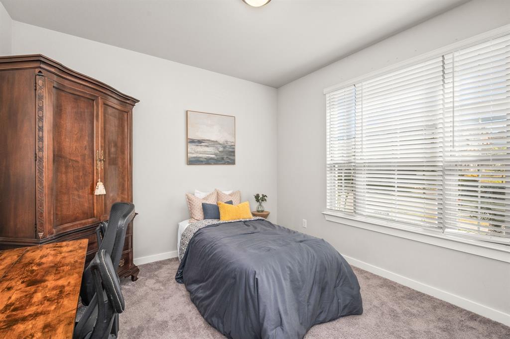 4017 Mapleleaf Pass Melissa, TX 75454 - Photo 16 of 32 a bed room with a bed and a window