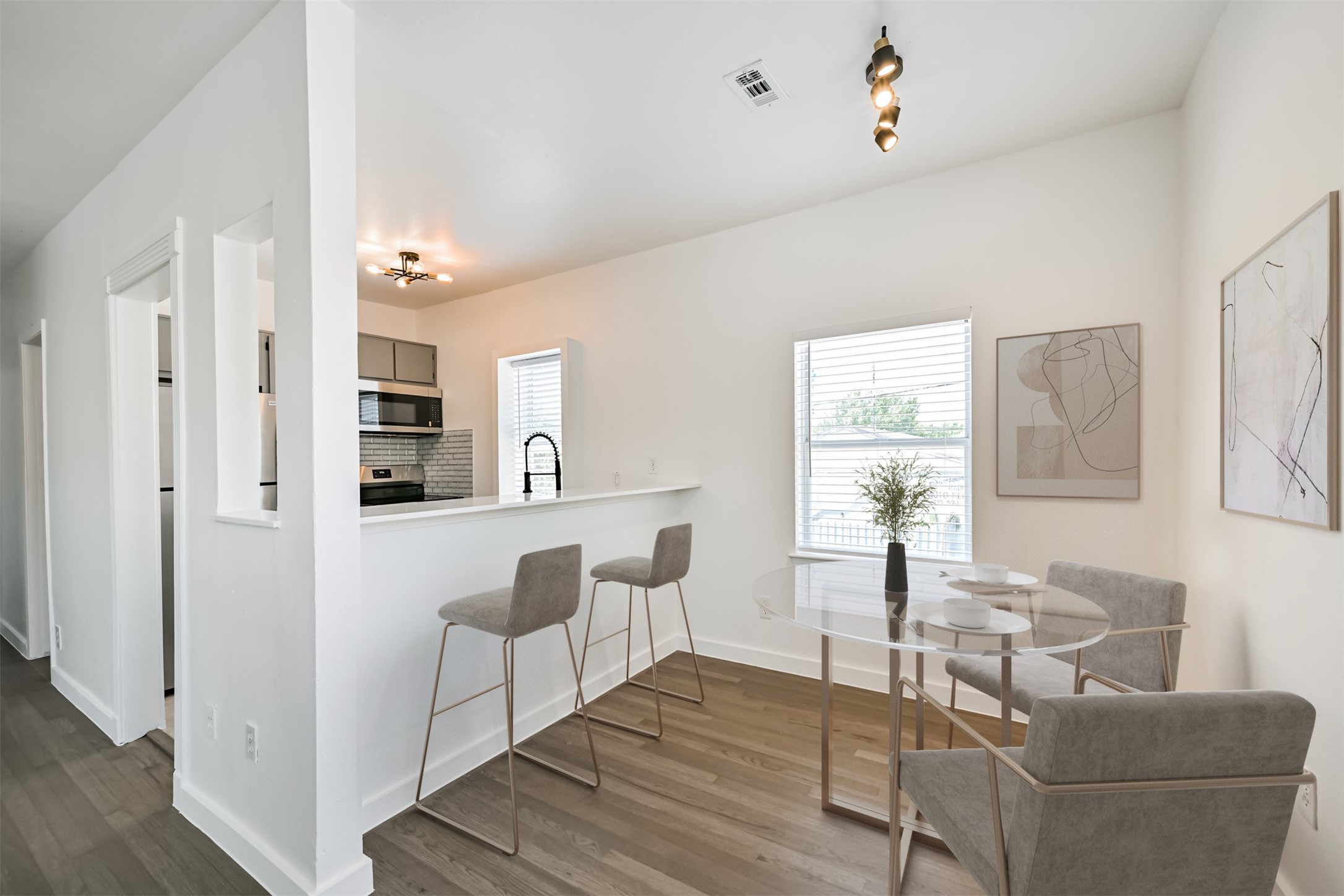 415 Fairview Street, Unit 9 Houston, TX 77006 - Photo 3 of 15 *Virtually staged* super cute breakfast area looking into the kitchen!