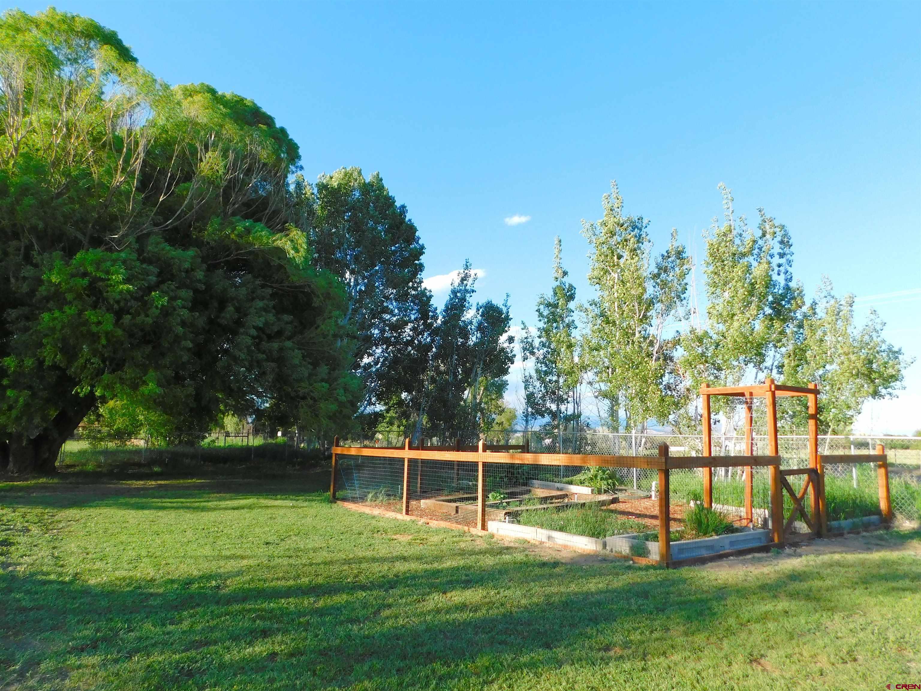 14977 F Road Delta, CO 81416 - Photo 36 of 45 a view of a house with a big yard