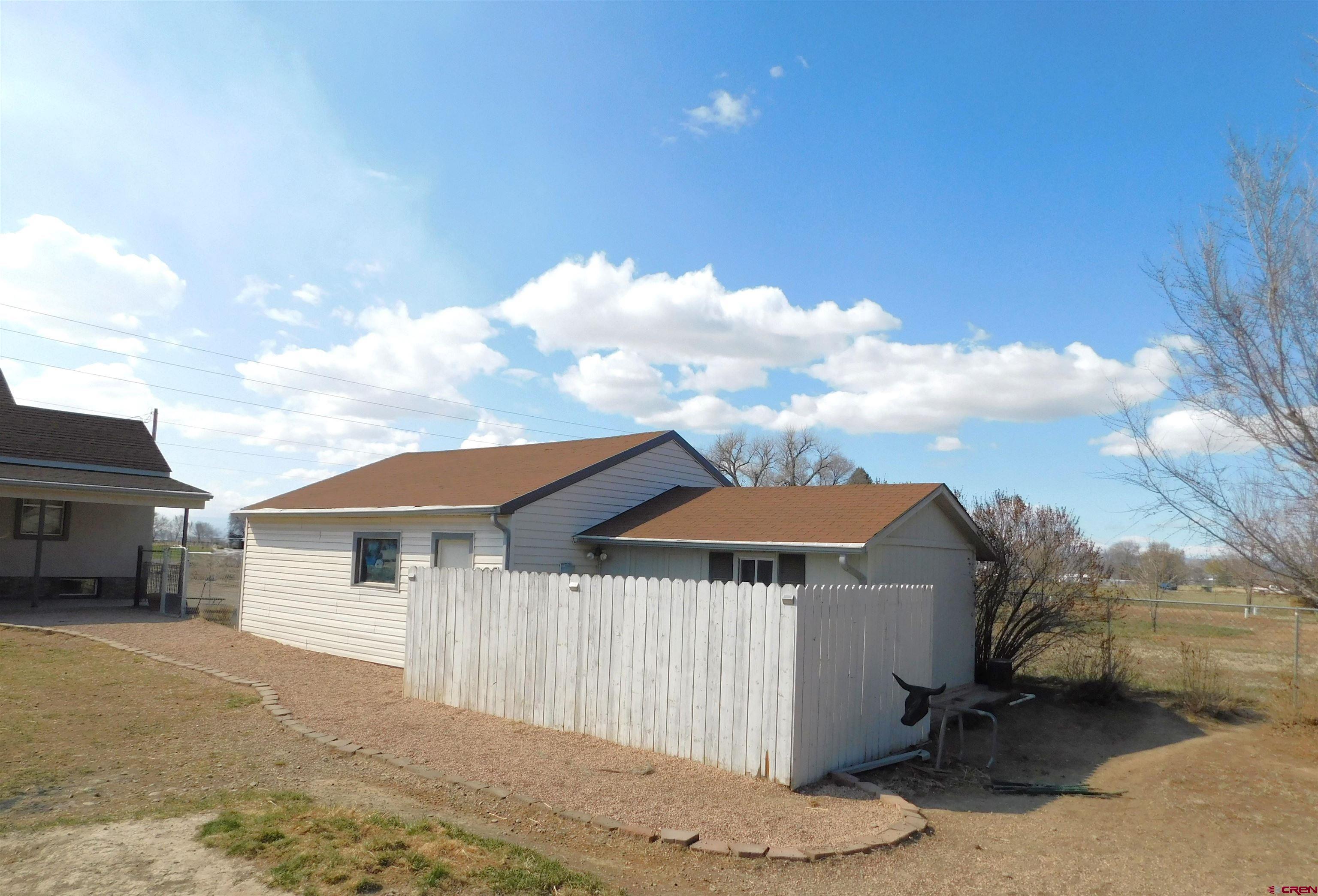 14977 F Road Delta, CO 81416 - Photo 39 of 45 a backyard of a house