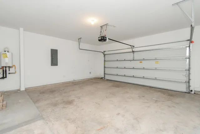 a bathroom with a sink a mirror and shower
