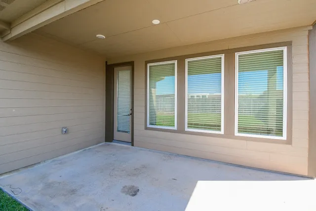 a view of a house with a garden