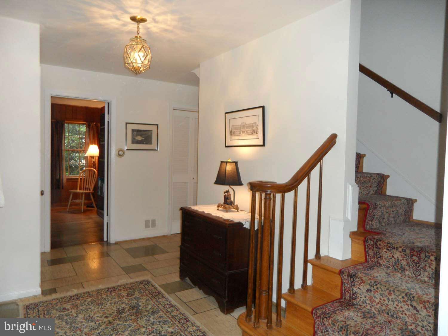 5908 Walhonding Road Bethesda, MD 20816 - Photo 3 of 26 a livingroom with furniture and a rug