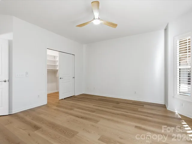 a view of an empty walk in closet