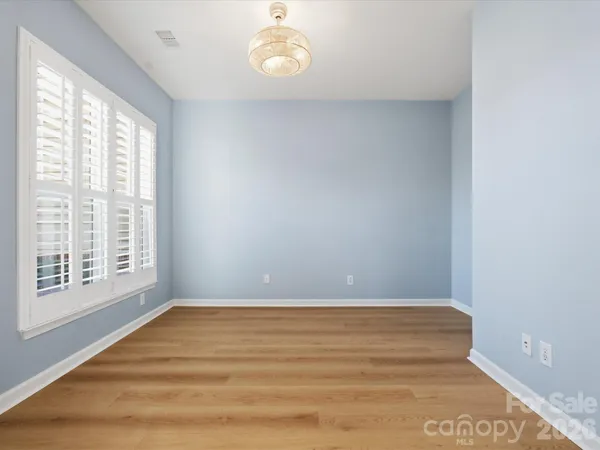 a workspace with furniture and window