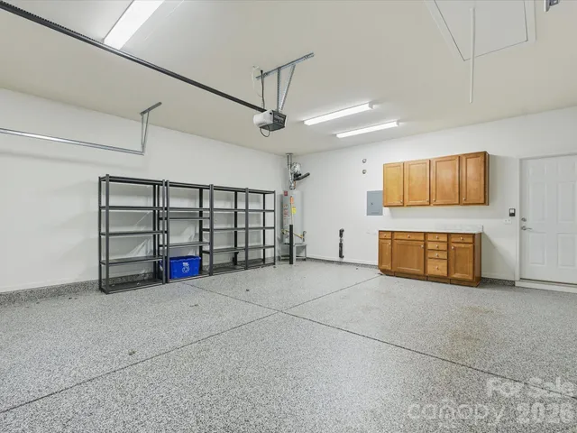 a view of a living room and floor to ceiling window