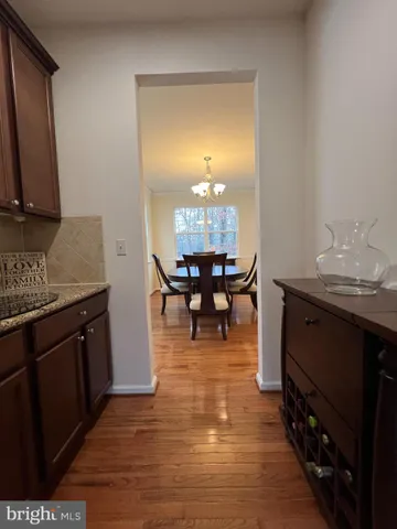 a bedroom with a bed and a lamp