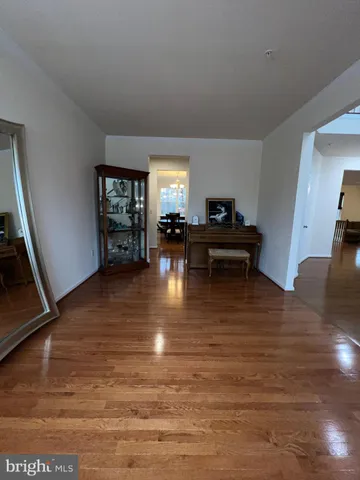 a view of a room with a large tree
