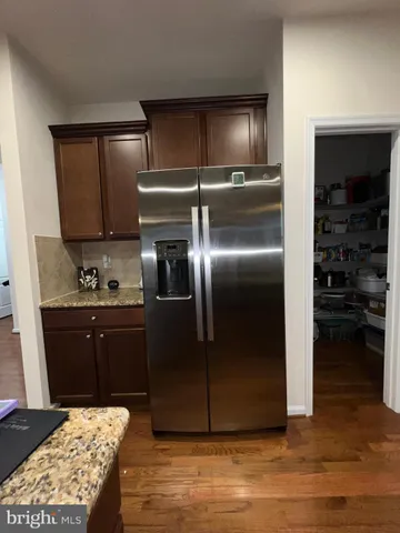 a bed room with a bed and a television