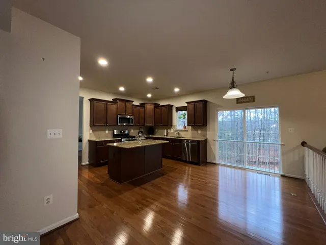 a bed room with a bed and a television