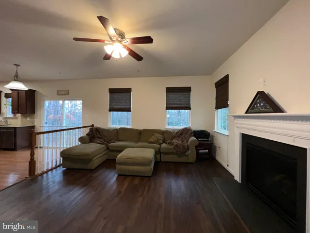 a bathroom with a double vanity sink mirror and shower