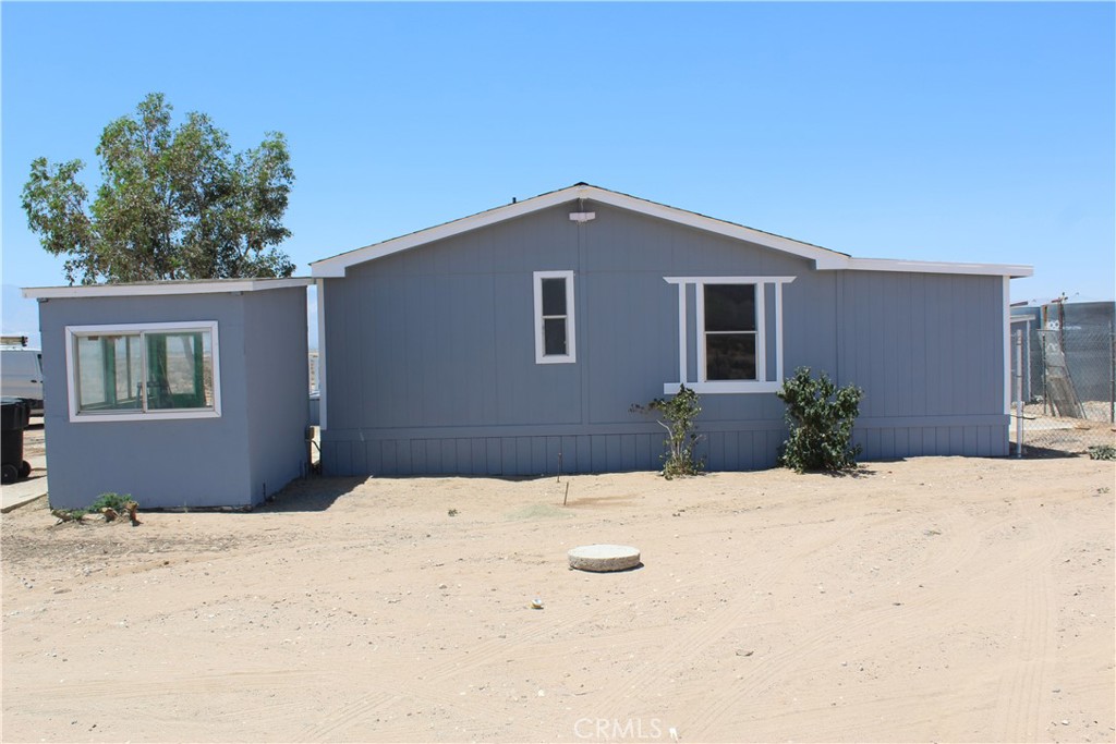 15030 Fairlane Road Lucerne Valley, CA 92356 - Photo 11 of 18 a house view with a outdoor space