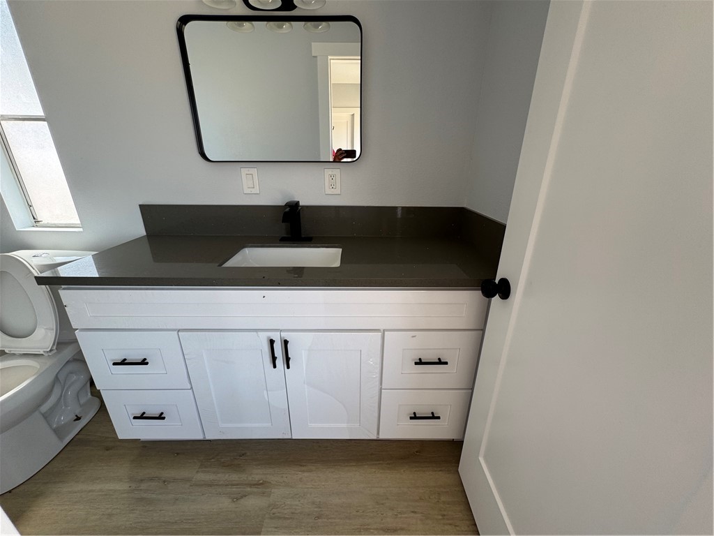 15030 Fairlane Road Lucerne Valley, CA 92356 - Photo 6 of 18 a bathroom with a sink and a mirror