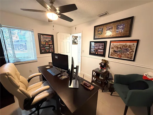 a view of a chairs and tables in the patio